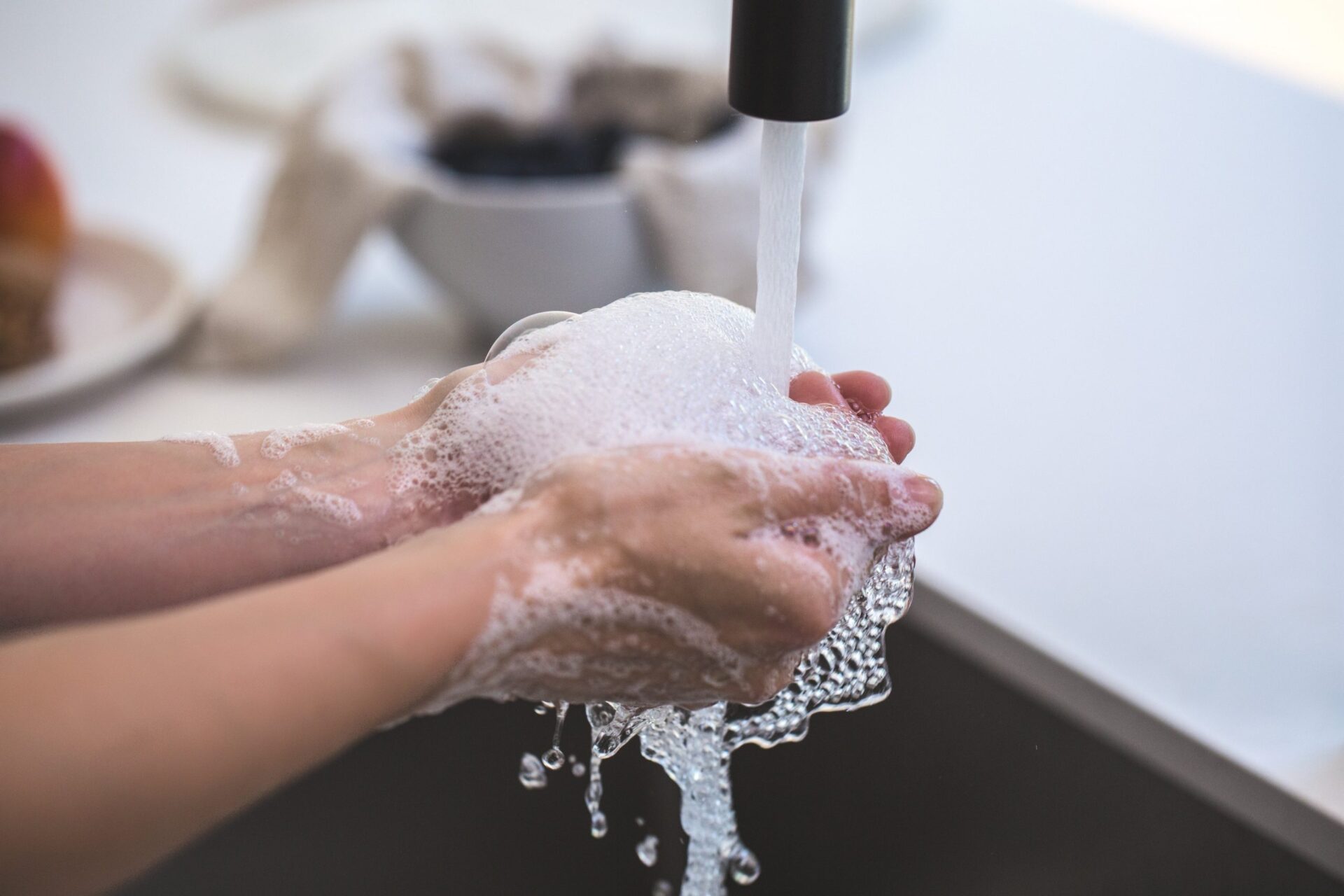 washing hands thoroughly