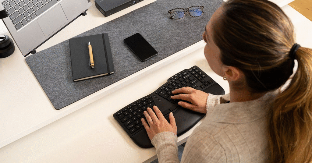 Woman resting hands on her keyboard