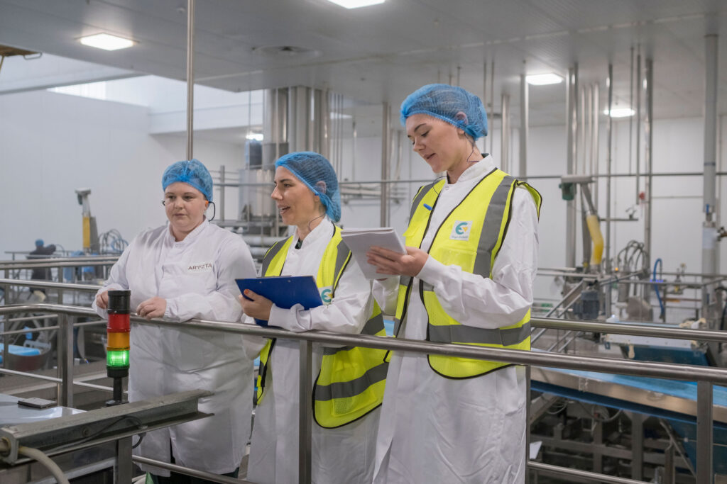 Woman using an industrial ergonomic checklist