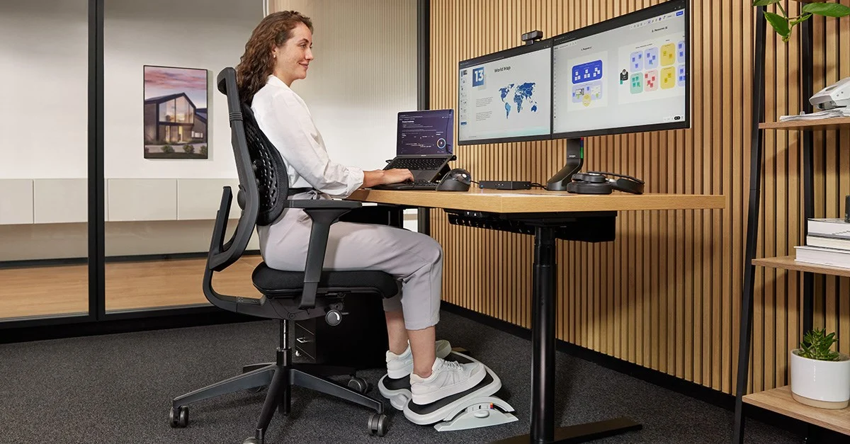 Woman with good posture sitting at workstation