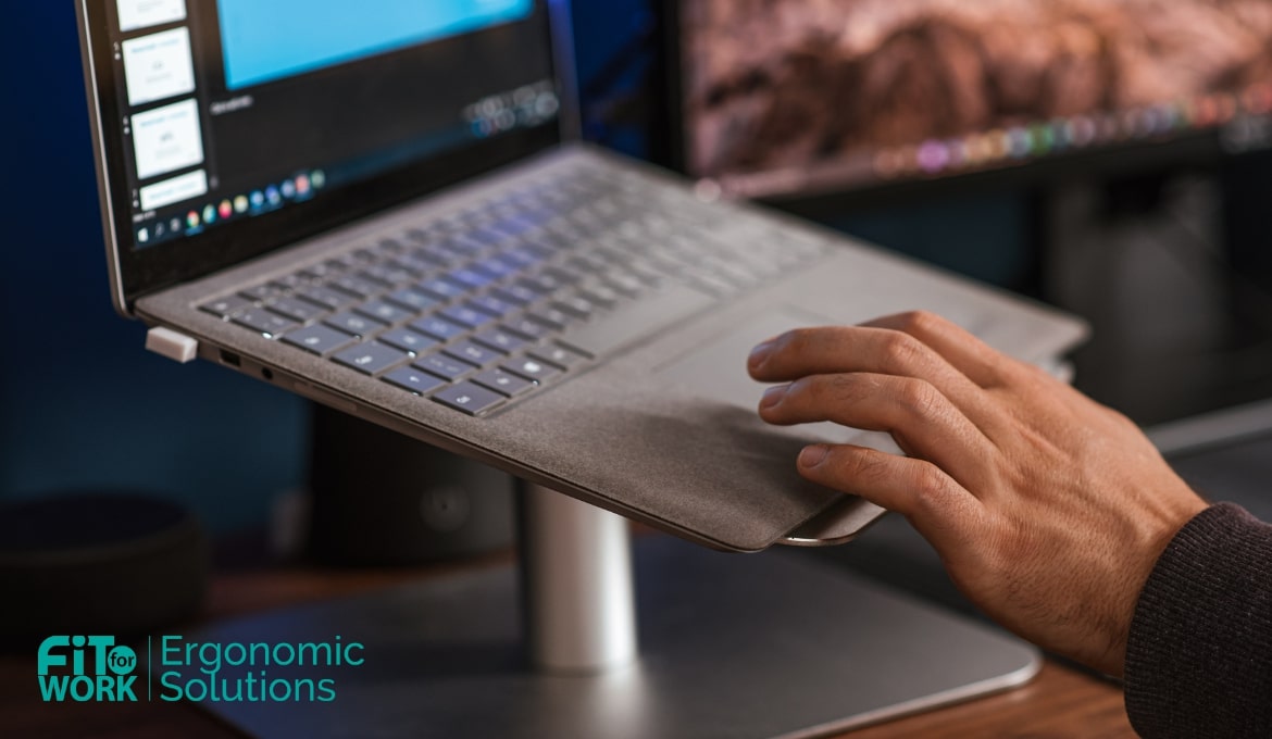 ergonomic desk setup of laptops