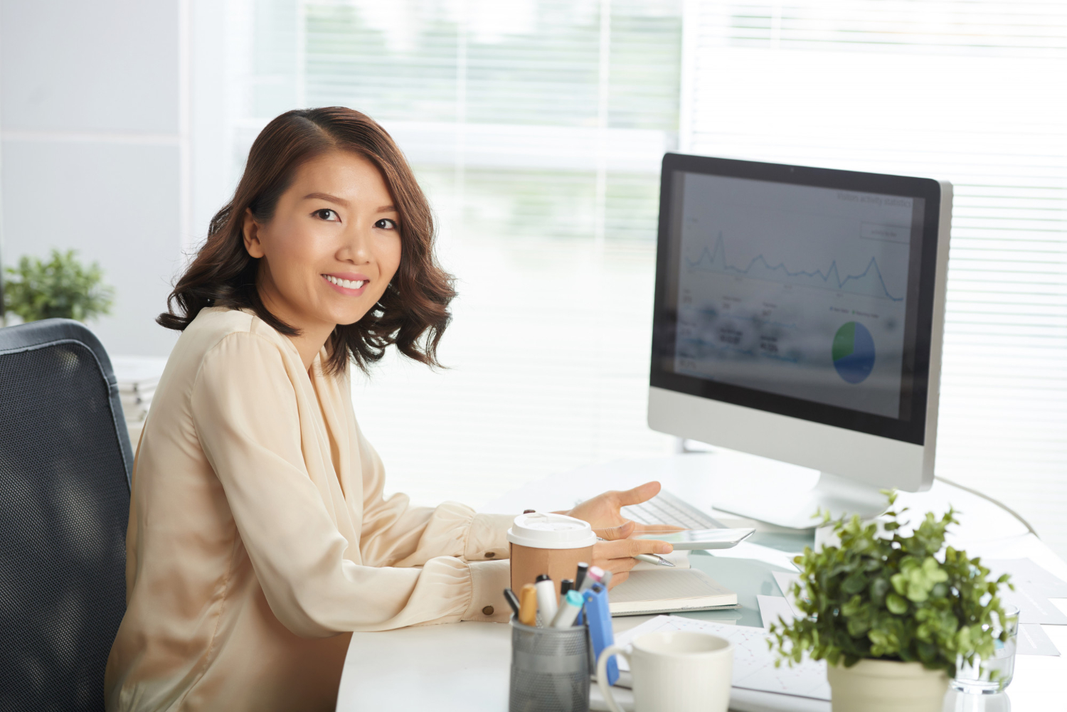 Person with a monitor set at eye level.
