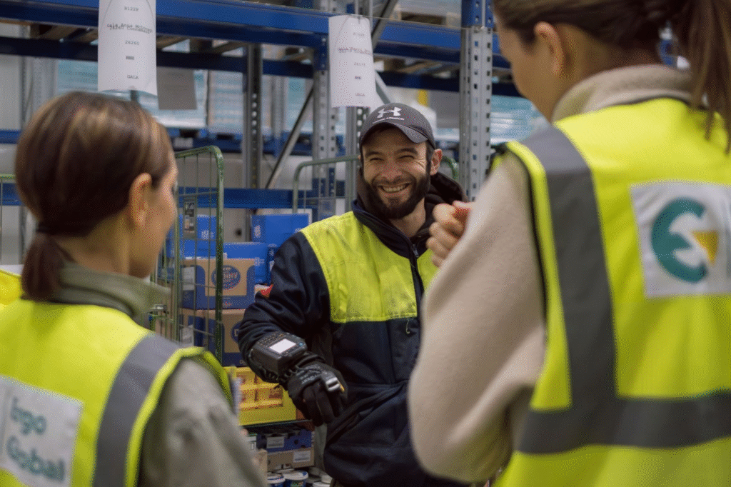 The benefits of ergonomic consulting services shown with a happy employee.