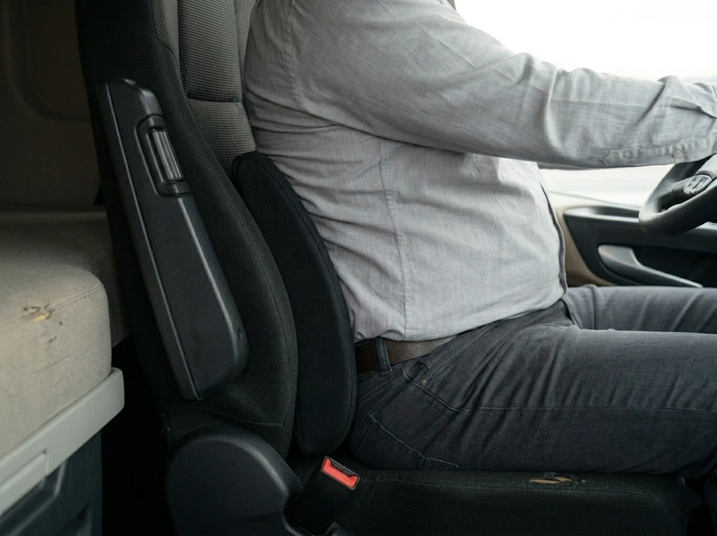 Fabric lumbar cushion in the natural spine curve.