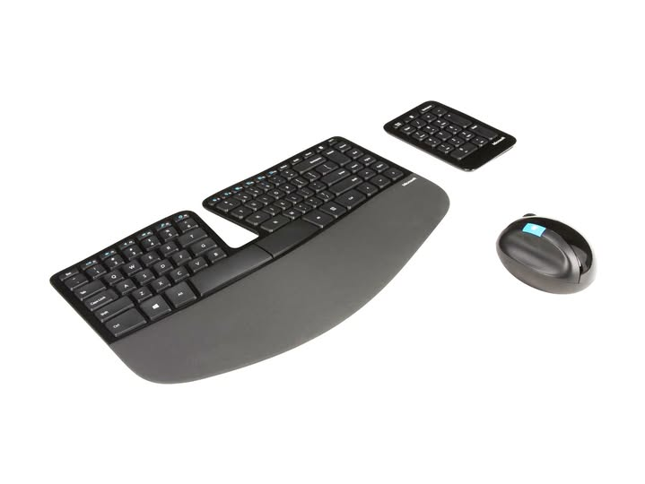 Microsoft Sculpt ergonomic dome keyboard and separate keypad. 