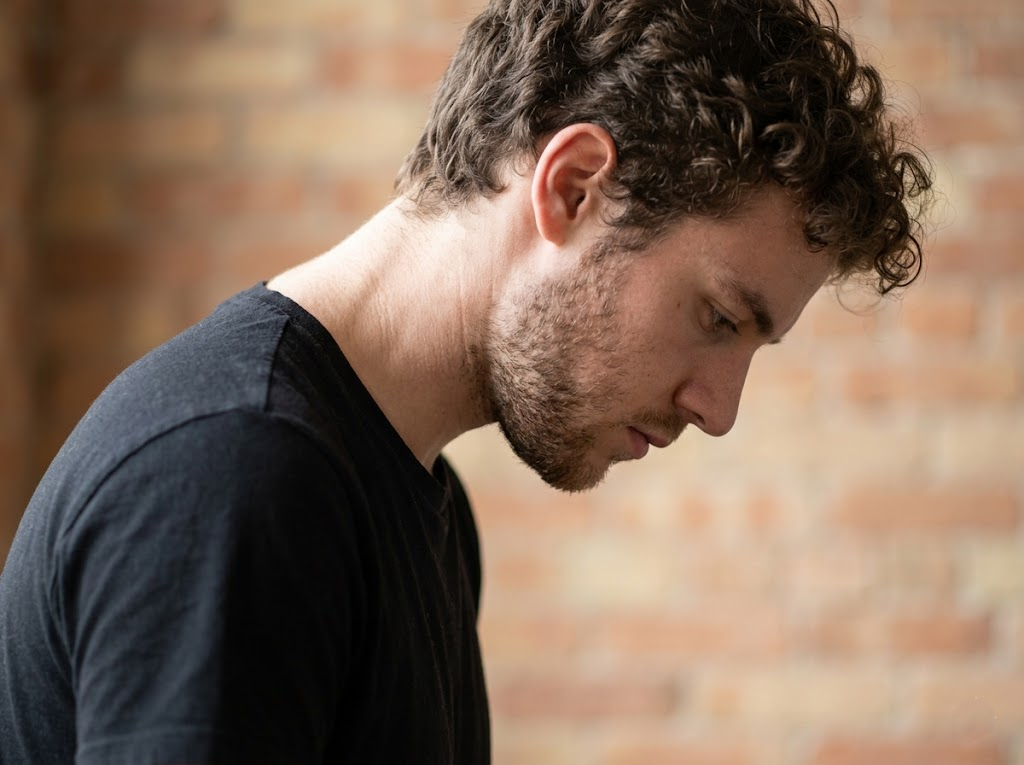 Close-up of a man's neck strained forward (tech neck).Â